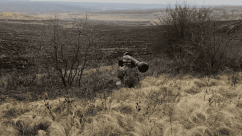 Ukrainian soldiers in intensive combat training simulating slow and dangerous frontline advances under modern warfare conditions