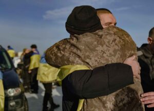 Ukrainian soldier returning from war interacting with civilians highlighting psychological reintegration and ethical behavior challenges