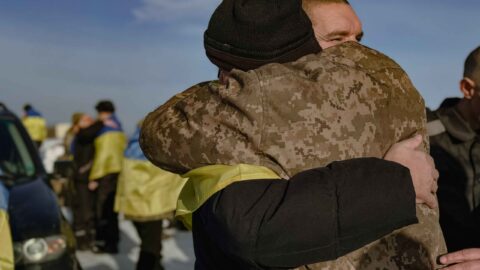 Ukrainian soldier returning from war interacting with civilians highlighting psychological reintegration and ethical behavior challenges