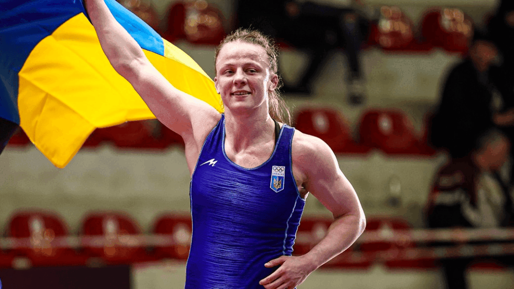 Ukrainian wrestler Iryna Koliadenko celebrates victory after winning gold at the European Wrestling Championships 2026