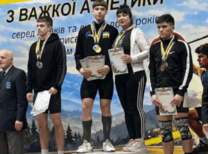 Ukrainian U17 weightlifting champion Mark Hvizdon performing clean and jerk during national championship in Kolomyia