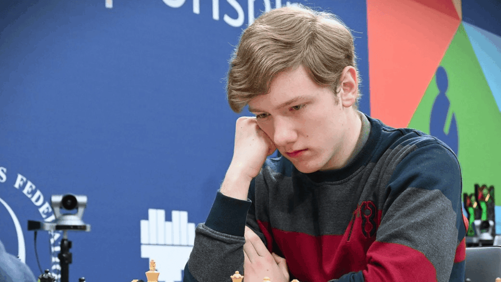 Young Ukrainian chess player competing at European Championship symbolizing breakthrough victory and historic non grandmaster title win