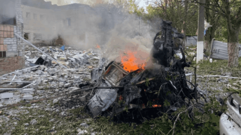 Emergency responders work at the site of damage in Kramatorsk after a Russian strike killed civilians in Donetsk region