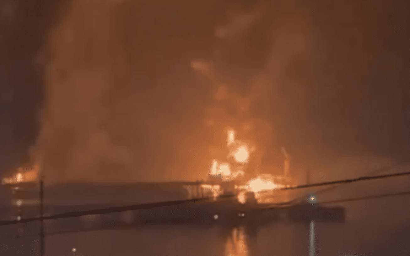Smoke rises above oil storage facilities in Novorossiysk after overnight drone strikes triggered fires at Russian fuel infrastructure