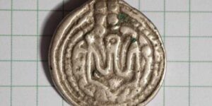 Ukraine coat of arms symbol of Volodymyr the Great on historical coin and modern Ukrainian state emblem