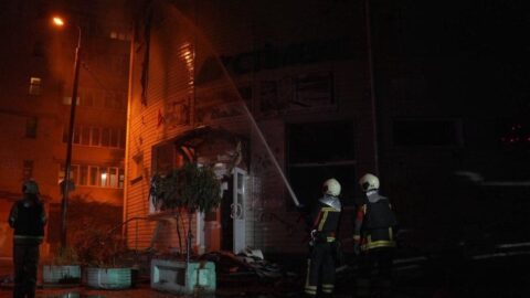 Aftermath of Russian ballistic missile strike on Kyiv with damaged buildings and fires