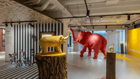 Pink elephant sculpture by Oleksandr Honcharov at the OURS exhibition, Zenyk Art Gallery Lviv, Ukrainian naive art