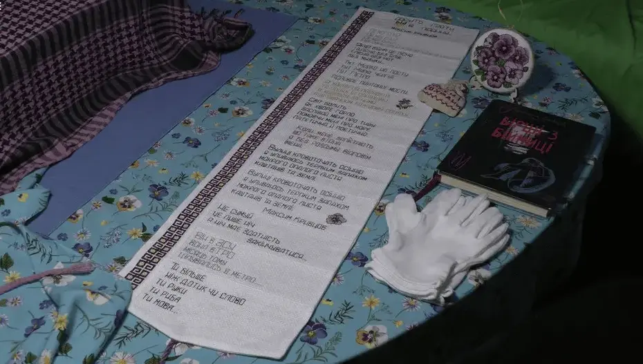 Embroidered poetry book To Bloom Like a Violet featuring 33 poems by fallen Ukrainian poet Maksym Kryvtsov