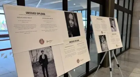 Unissued Diplomas exhibition displays honoring Ukrainian students killed in the war at Forum 2000 in Prague